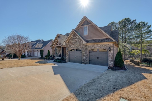 craftsman inspired home with a garage