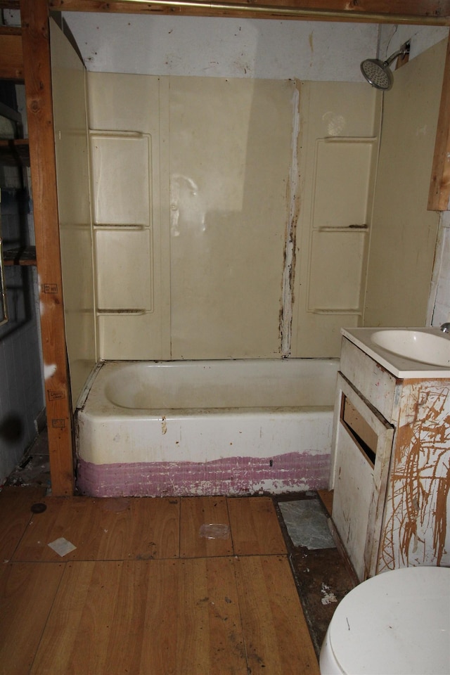 bathroom featuring vanity, hardwood / wood-style floors, and toilet