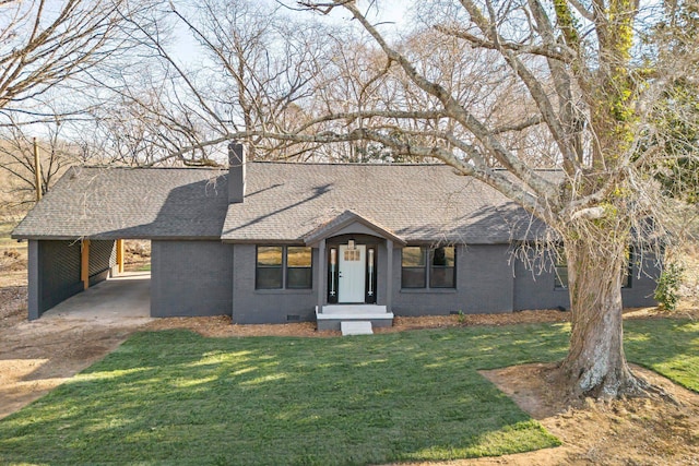 view of front facade featuring a carport and a front yard