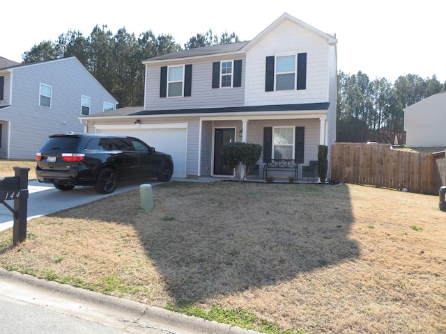 view of property with a garage, a front lawn, and a porch