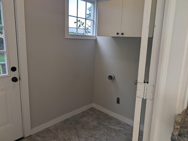 laundry room with cabinets