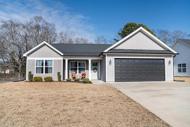 ranch-style house with a garage and a front yard