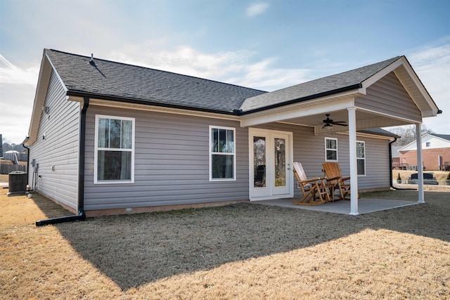 back of house with central AC unit, a yard, a patio, and ceiling fan