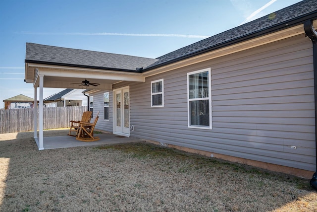 rear view of property with french doors, ceiling fan, and a patio