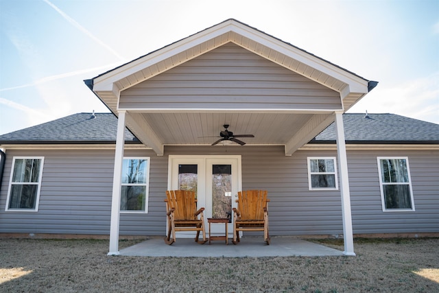 back of property featuring a patio, ceiling fan, and a lawn