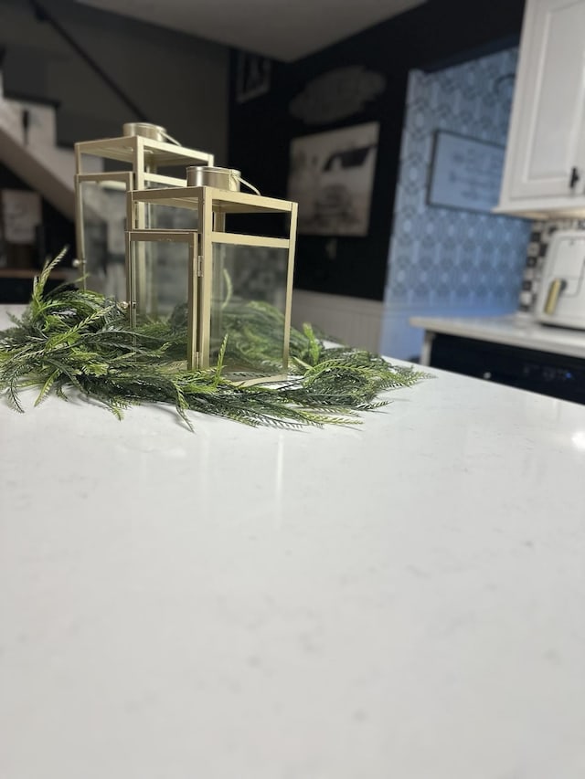 interior details featuring white cabinets