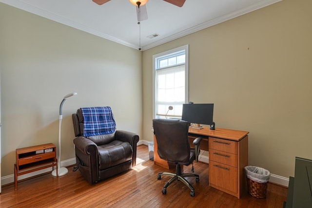 office area featuring ornamental molding, ceiling fan, and light wood-type flooring