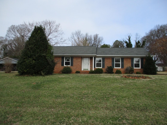 ranch-style house with a front yard