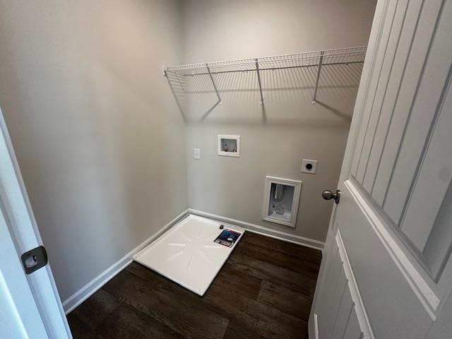 laundry room with washer hookup, hookup for an electric dryer, and dark hardwood / wood-style flooring