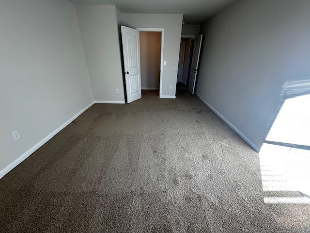 unfurnished bedroom featuring carpet floors