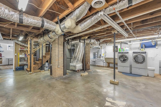 basement featuring separate washer and dryer