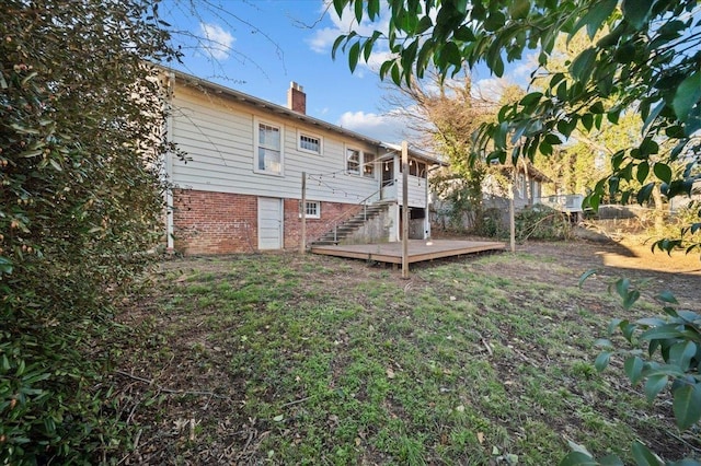 view of yard with a wooden deck