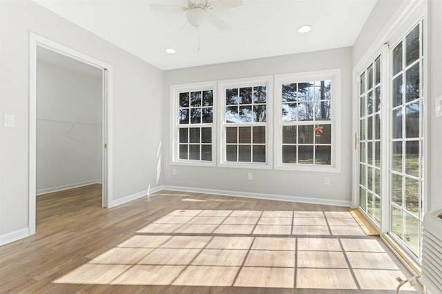 interior space featuring ceiling fan