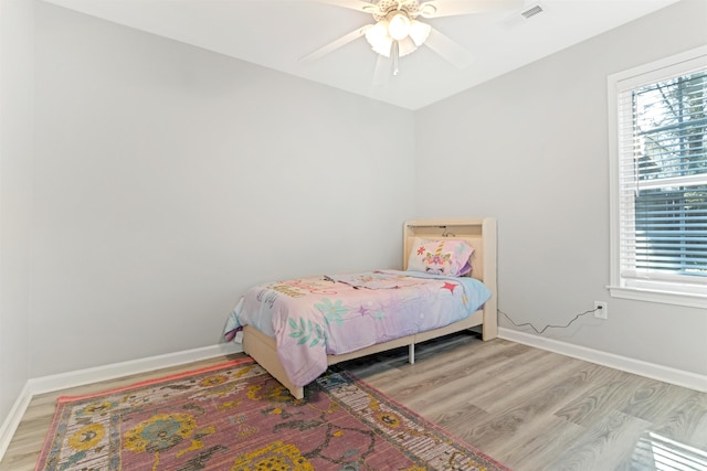 bedroom featuring ceiling fan and light wood-type flooring