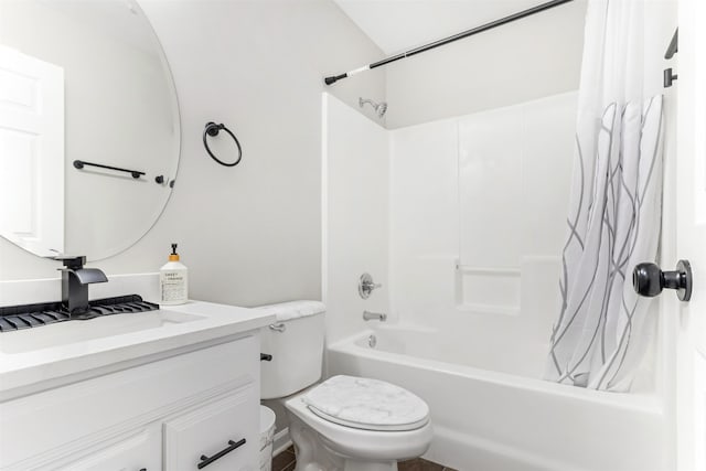 full bathroom featuring vanity, toilet, and shower / bath combo with shower curtain