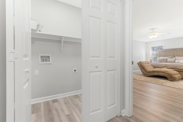 laundry room featuring ceiling fan, hookup for an electric dryer, washer hookup, and light hardwood / wood-style floors