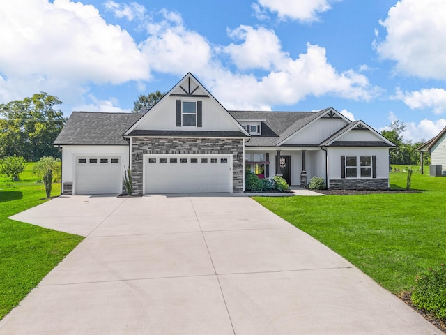 view of front facade with a garage and a front lawn