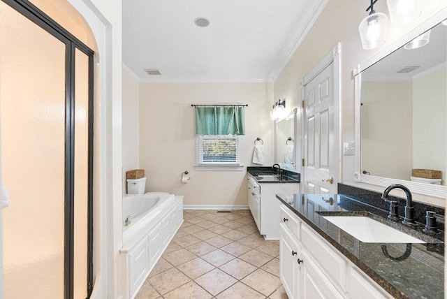 bathroom featuring tile patterned flooring, crown molding, a washtub, and vanity