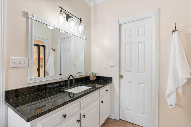 bathroom with vanity and tile patterned floors