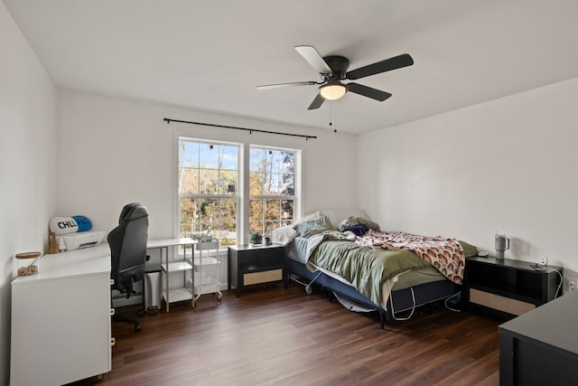 bedroom featuring dark hardwood / wood-style floors and ceiling fan