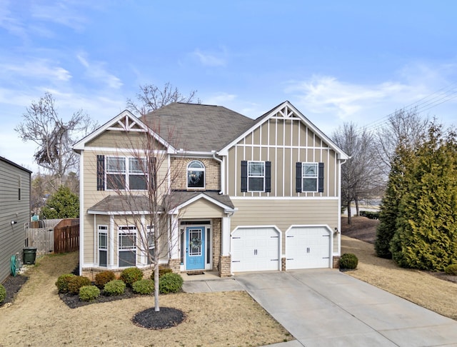 view of front facade with a garage and a front lawn