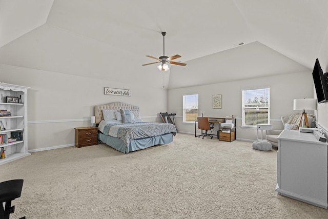 bedroom with ceiling fan, lofted ceiling, and carpet