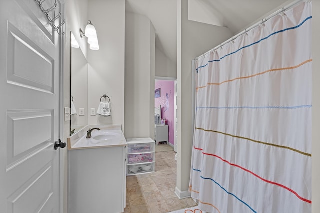 bathroom with vanity and a shower with curtain