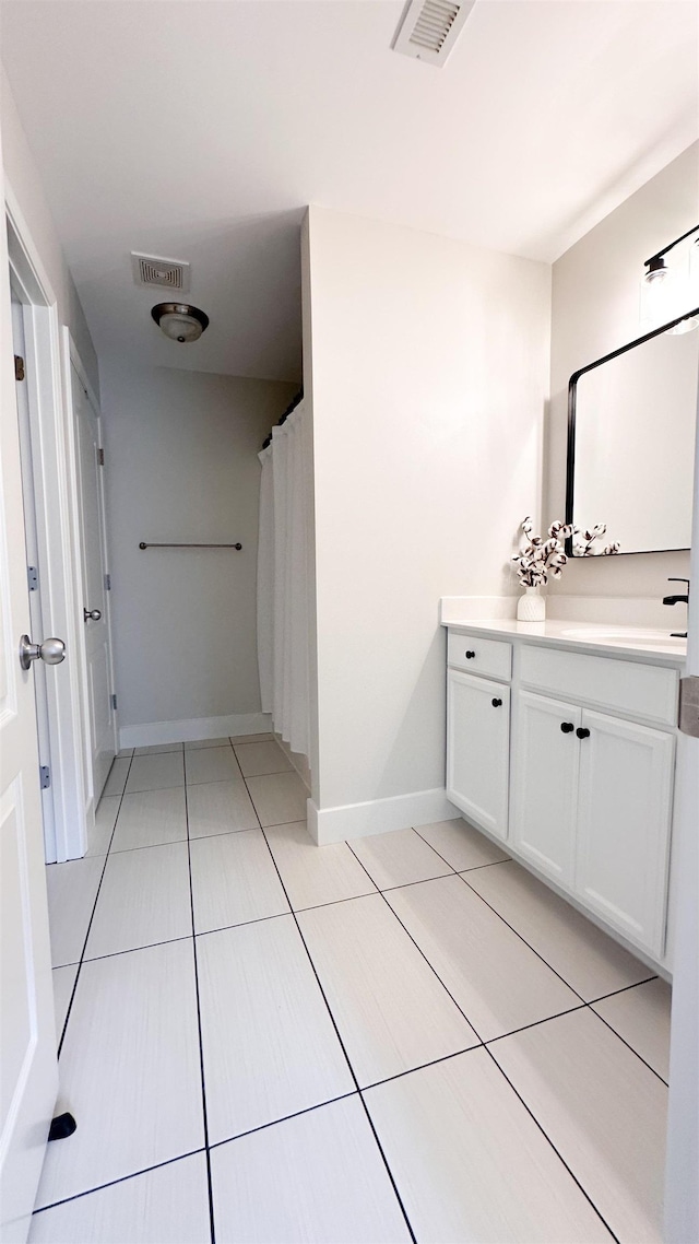 bathroom featuring vanity and tile patterned floors