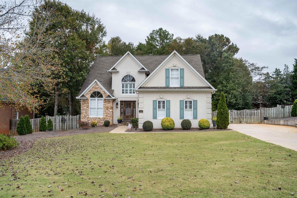 view of front property with a front lawn