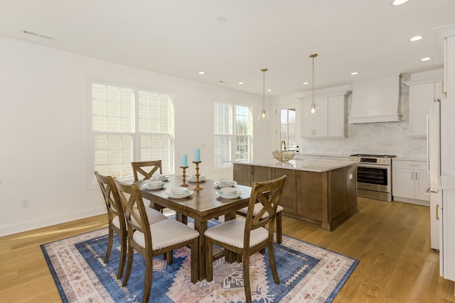 dining area featuring light hardwood / wood-style flooring