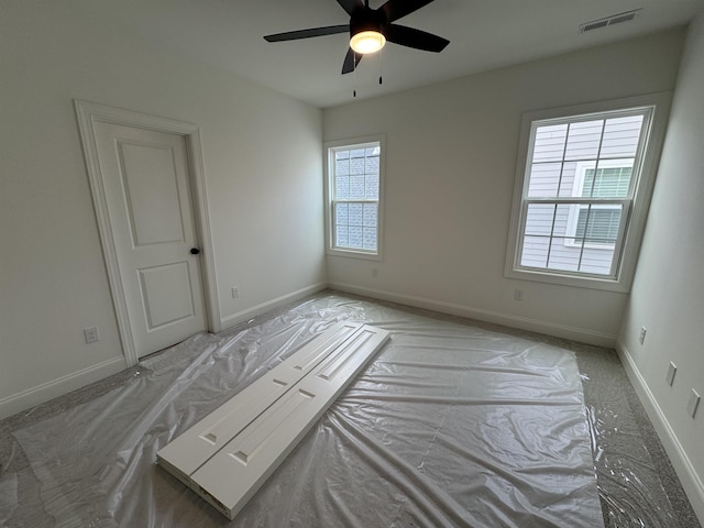 spare room featuring ceiling fan