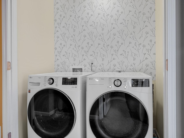 washroom featuring separate washer and dryer