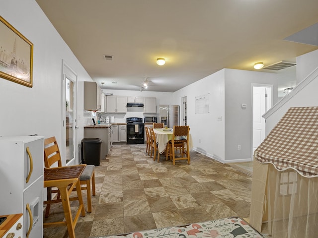 dining space with sink