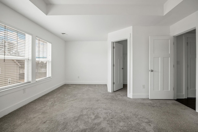 unfurnished bedroom featuring light colored carpet