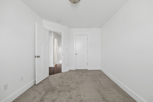 unfurnished bedroom featuring carpet flooring