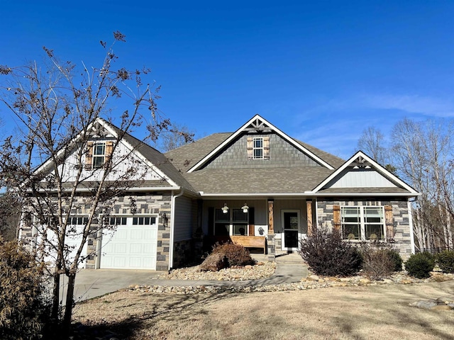 craftsman-style house featuring a garage and covered porch