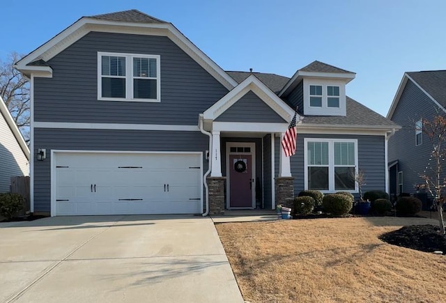 craftsman-style home featuring a garage