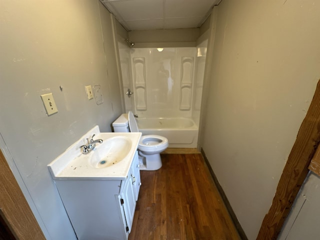 full bathroom with vanity, toilet, shower / bathing tub combination, and wood-type flooring