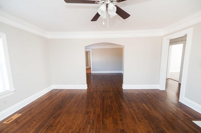 spare room featuring ornamental molding, dark hardwood / wood-style floors, and ceiling fan