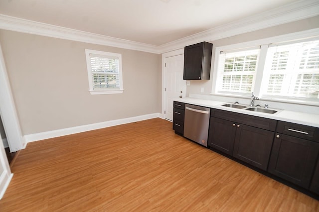 kitchen with crown molding, dishwasher, sink, and dark brown cabinets