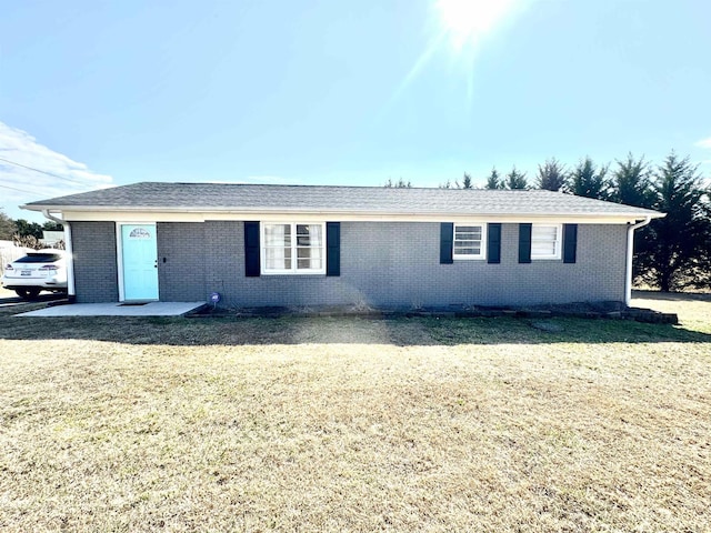 view of front of home with a front yard