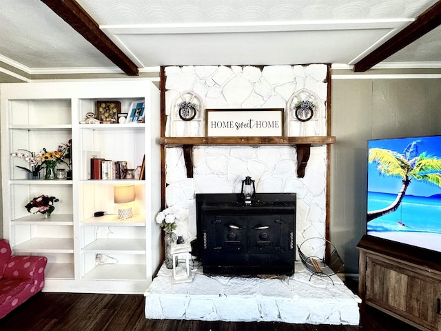 room details featuring hardwood / wood-style floors, beam ceiling, ornamental molding, and built in shelves