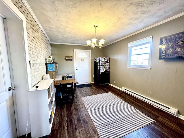 dining space featuring crown molding, an inviting chandelier, brick wall, dark hardwood / wood-style flooring, and a baseboard radiator