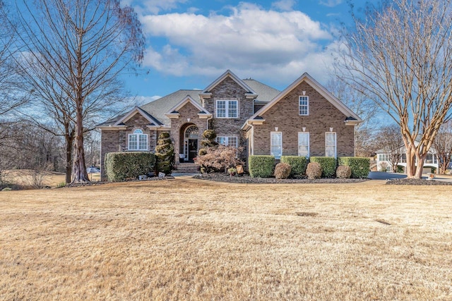 view of front property with a front lawn