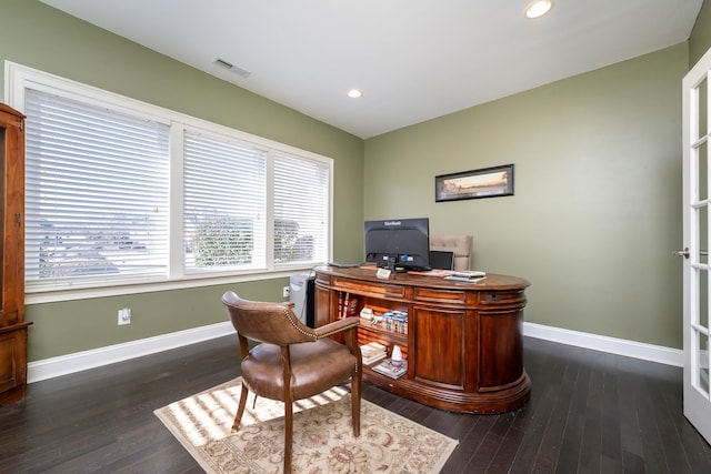 office with dark hardwood / wood-style floors