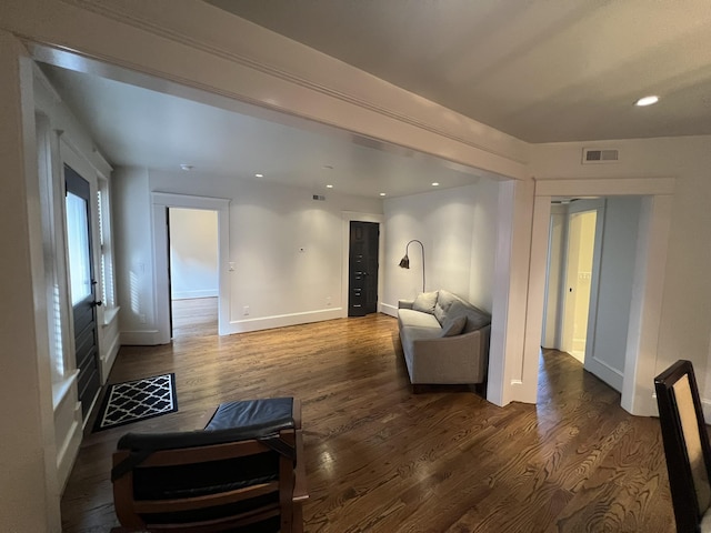 living room with dark wood-type flooring