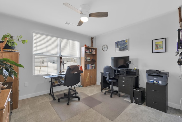 office featuring light colored carpet and ceiling fan