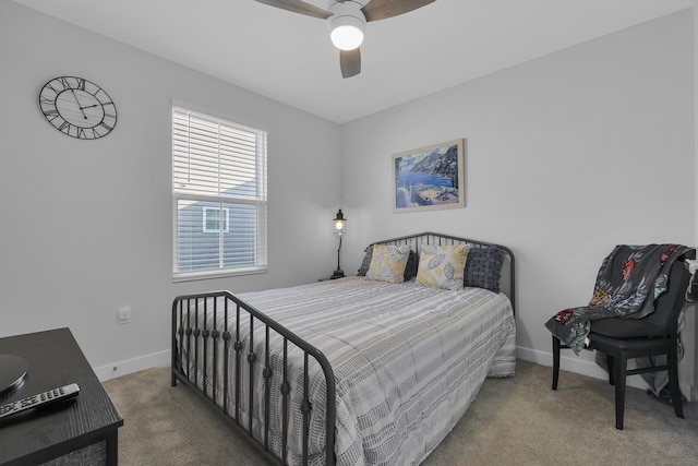 bedroom with ceiling fan and carpet