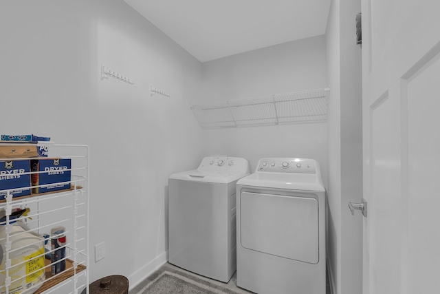 laundry room featuring washing machine and dryer