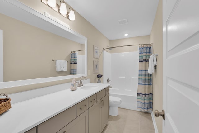 full bathroom featuring tile patterned flooring, vanity, shower / bath combo, and toilet